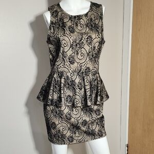 Chic Black and Cream Peplum Lace Dress